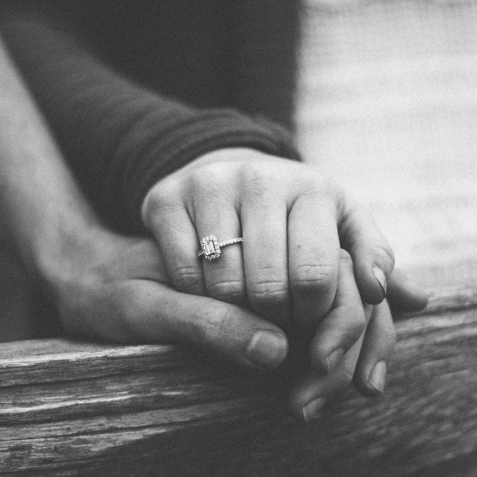 Engagement ring lovingly holding hands - Camellio Wedding Planning and Events - Essex Wedding Planner