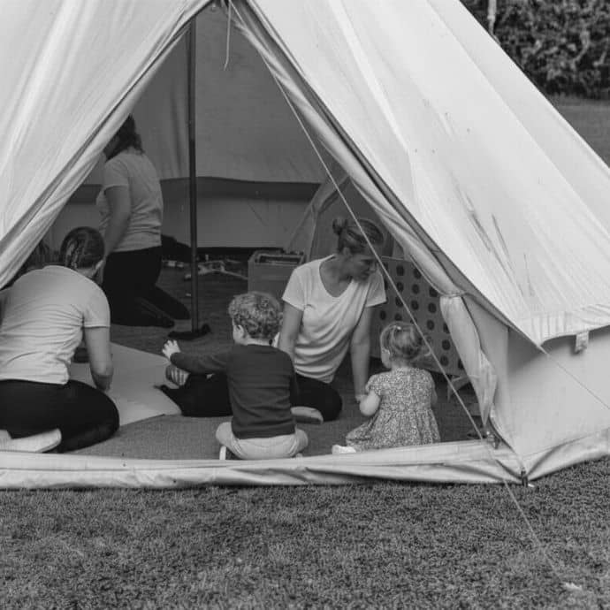 Children playing in a play tipi at a garden, marquee wedding - Camellio Wedding Planning and Events - Essex Wedding Planner