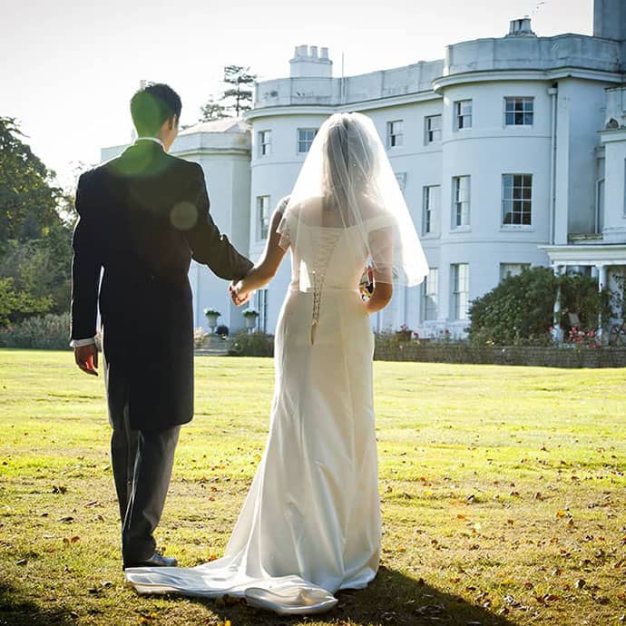 Newly wed Couple in front of Blake Hall, Ongar 